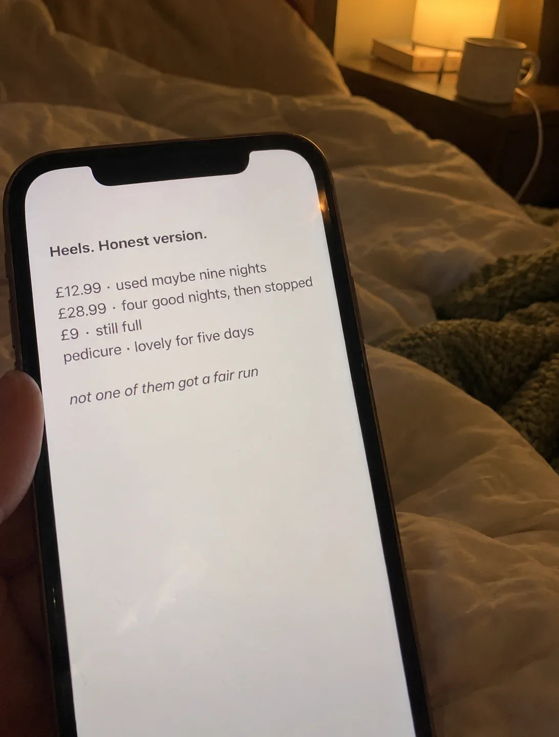 A phone showing a notes app list headed "Heels. Honest version."