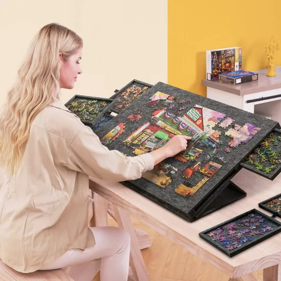 PuzzleNest with the felt cover closed over an unfinished puzzle